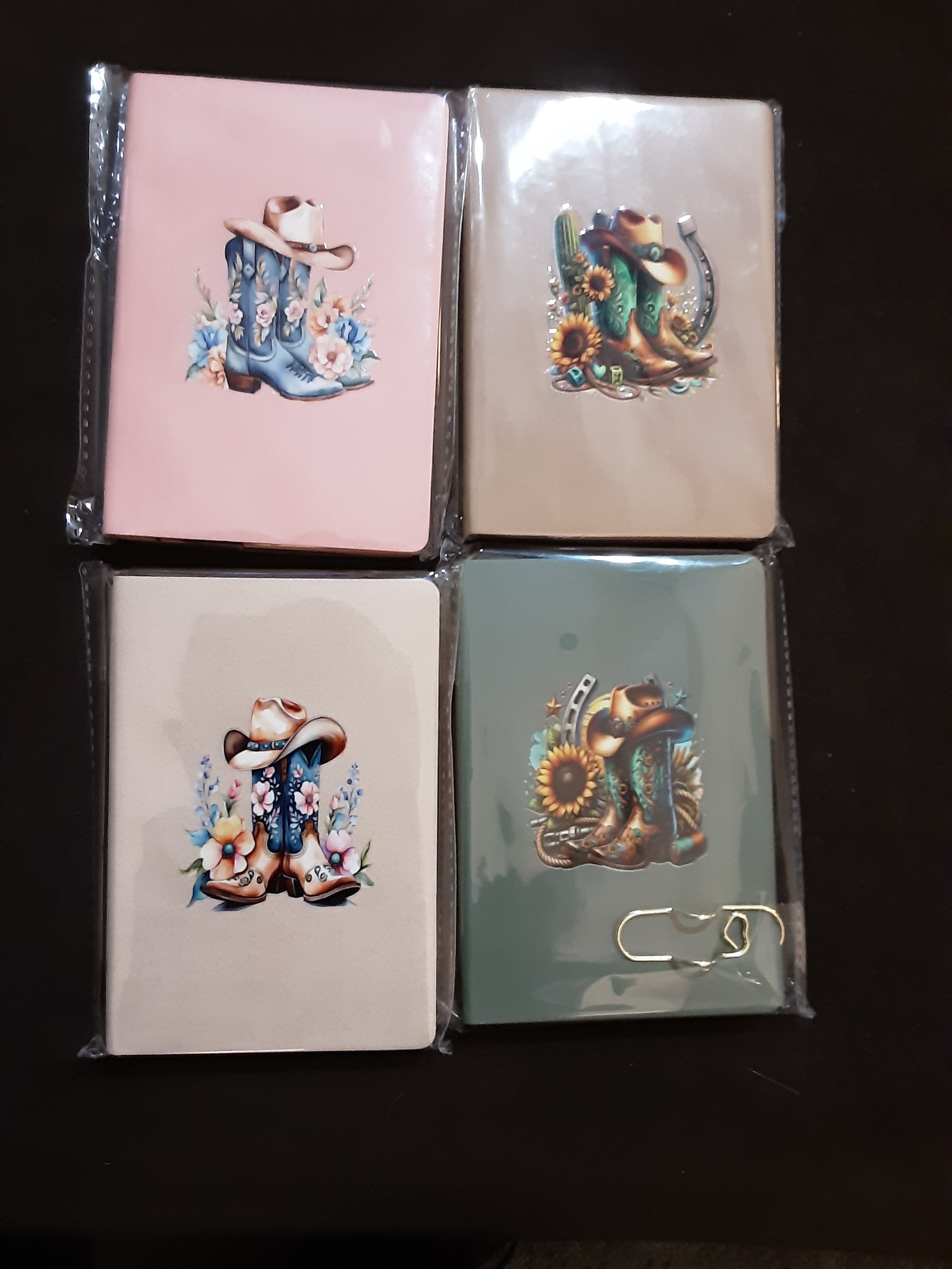 Purse size notebook with pen holder clip