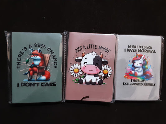 Purse size notebook with pen holder clip