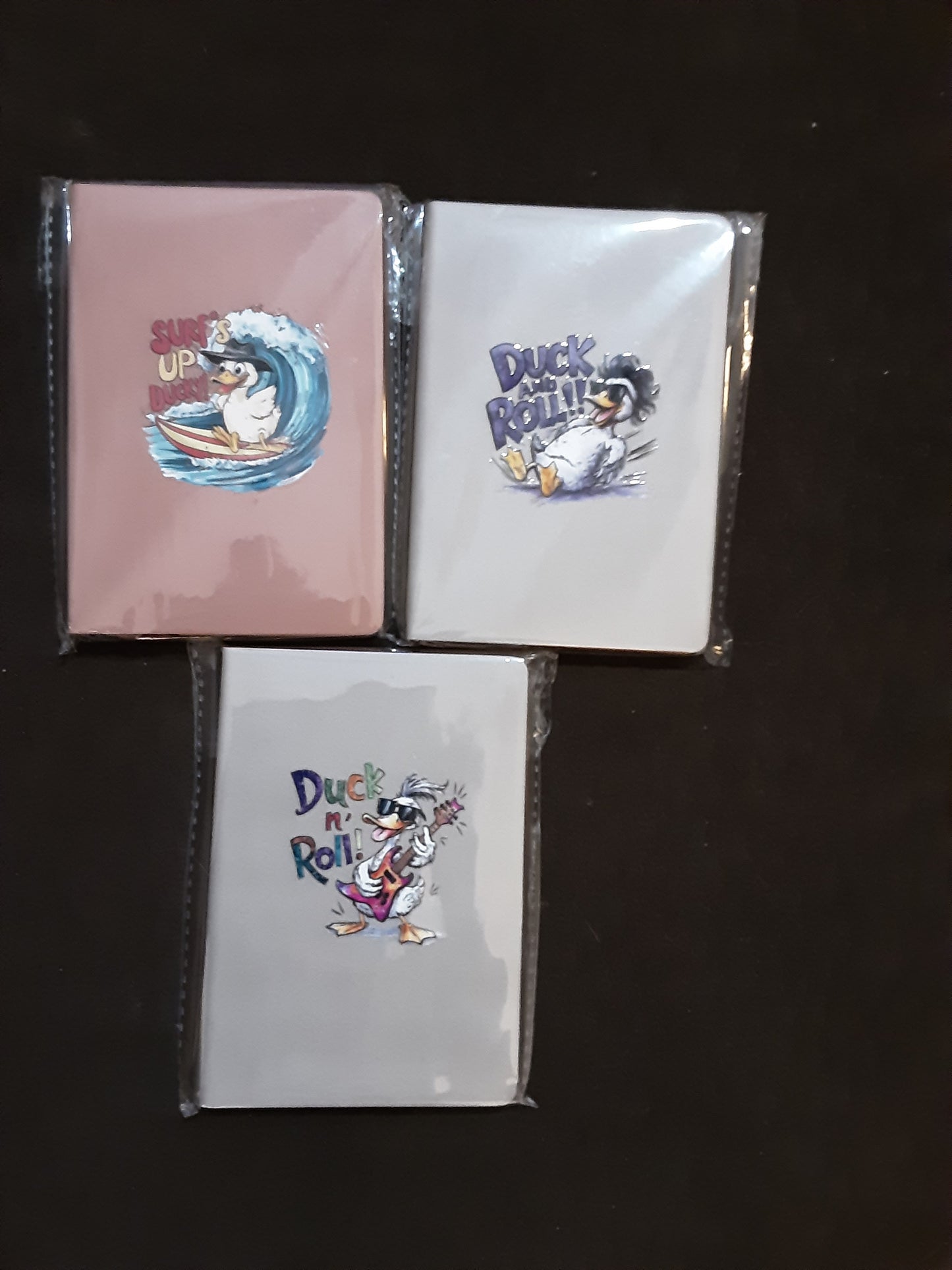 Purse size notebook with pen holder clip