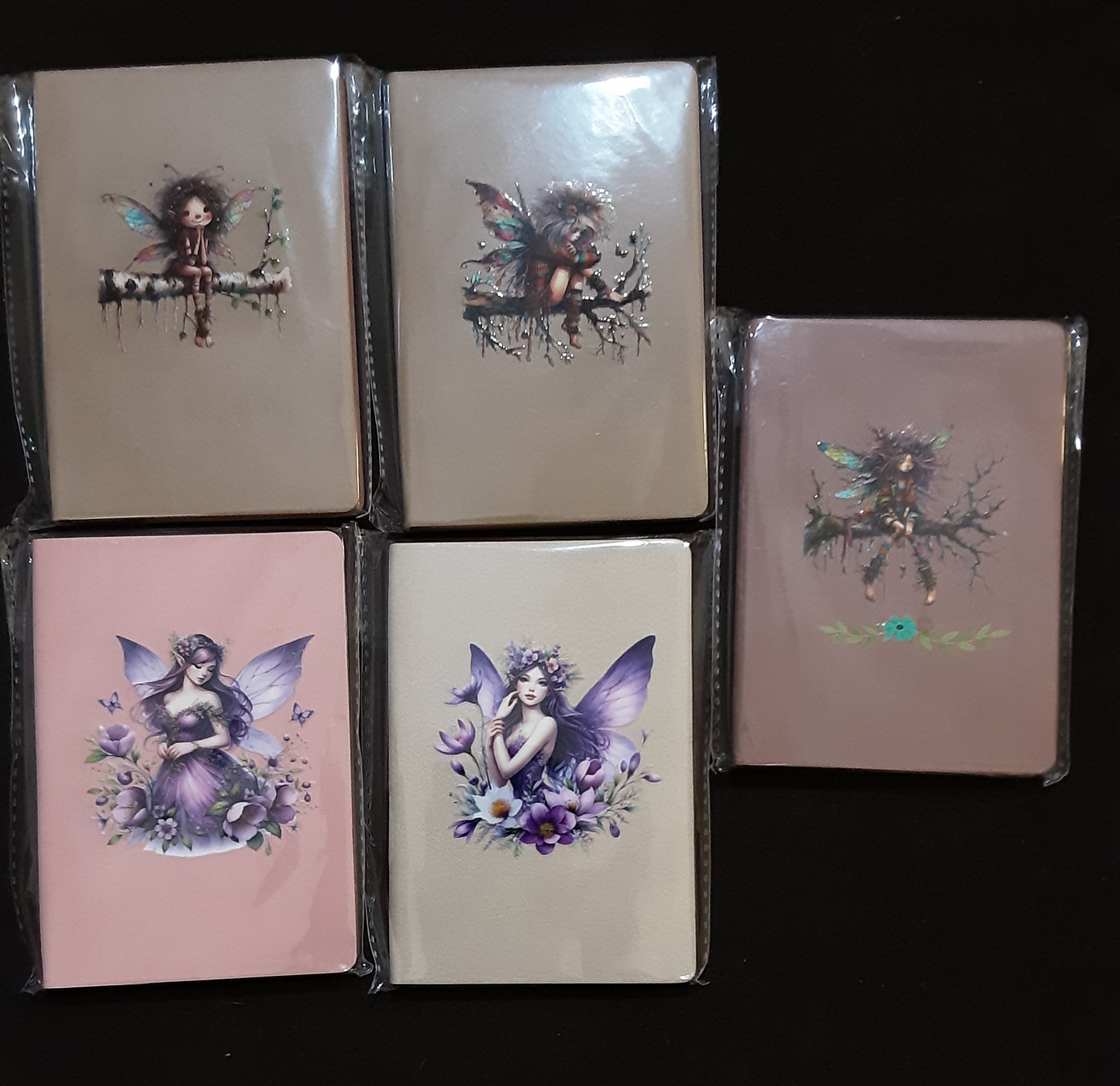 Purse size notebook with pen holder clip