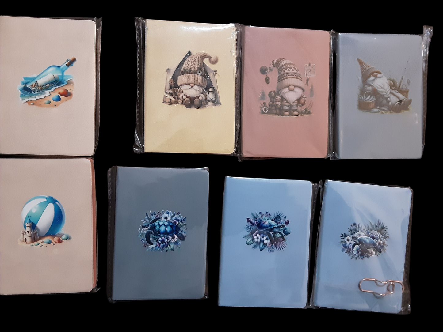 Purse size notebook with pen holder clip